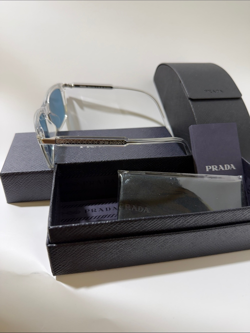 Prada Clear Frame Sunglasses with Blue Lenses - Picture 5 of 5